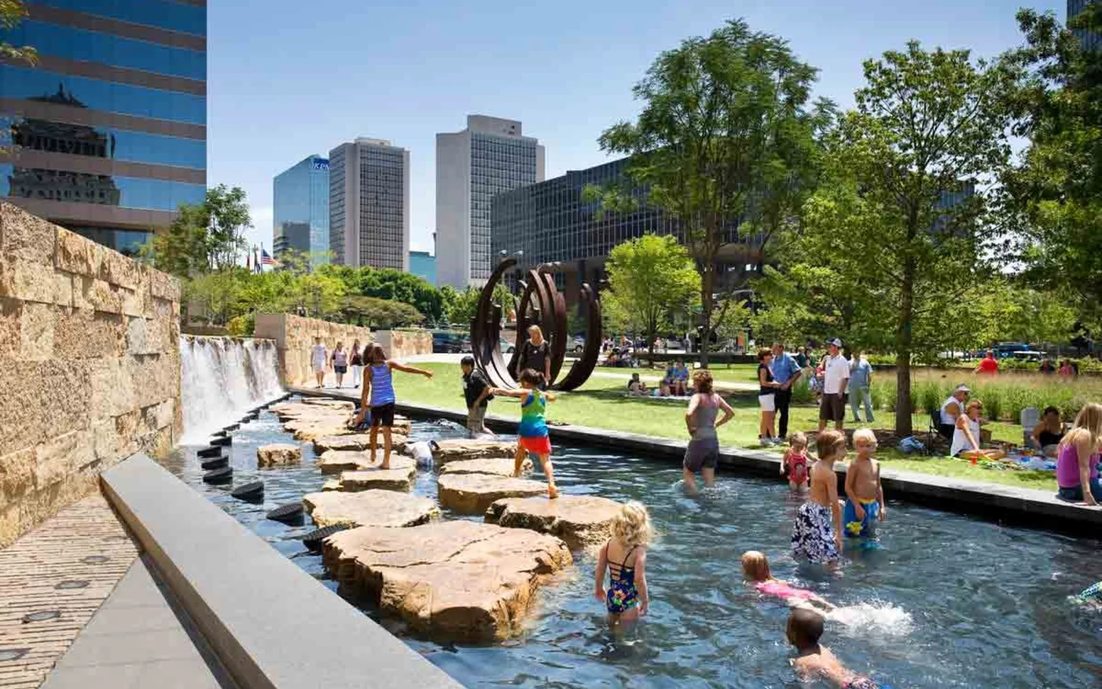 Families and neighbors enjoying Citygarden in downtown St. Louis, Missouri