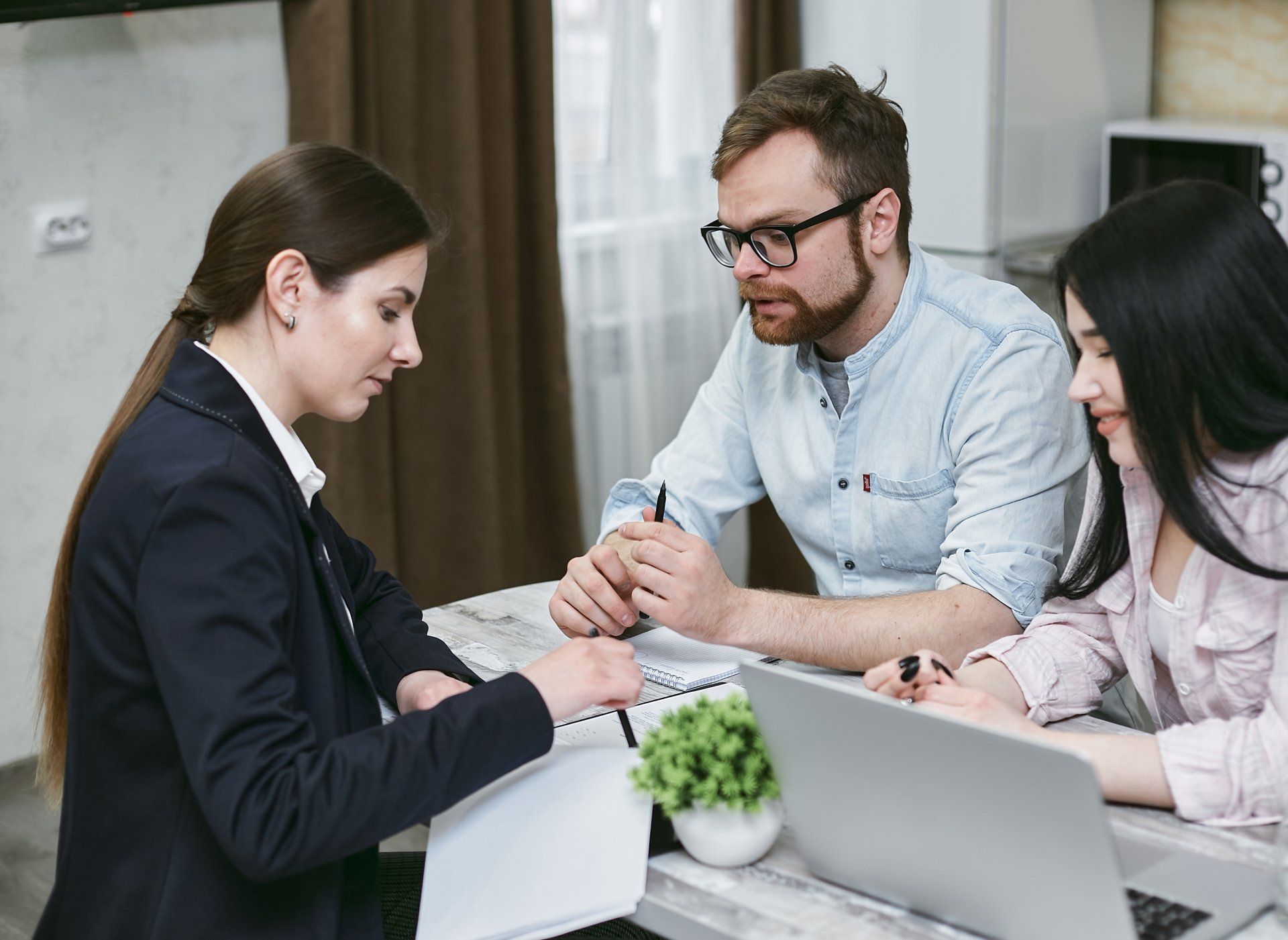 Attorney reviewing an insurance claim with a client
